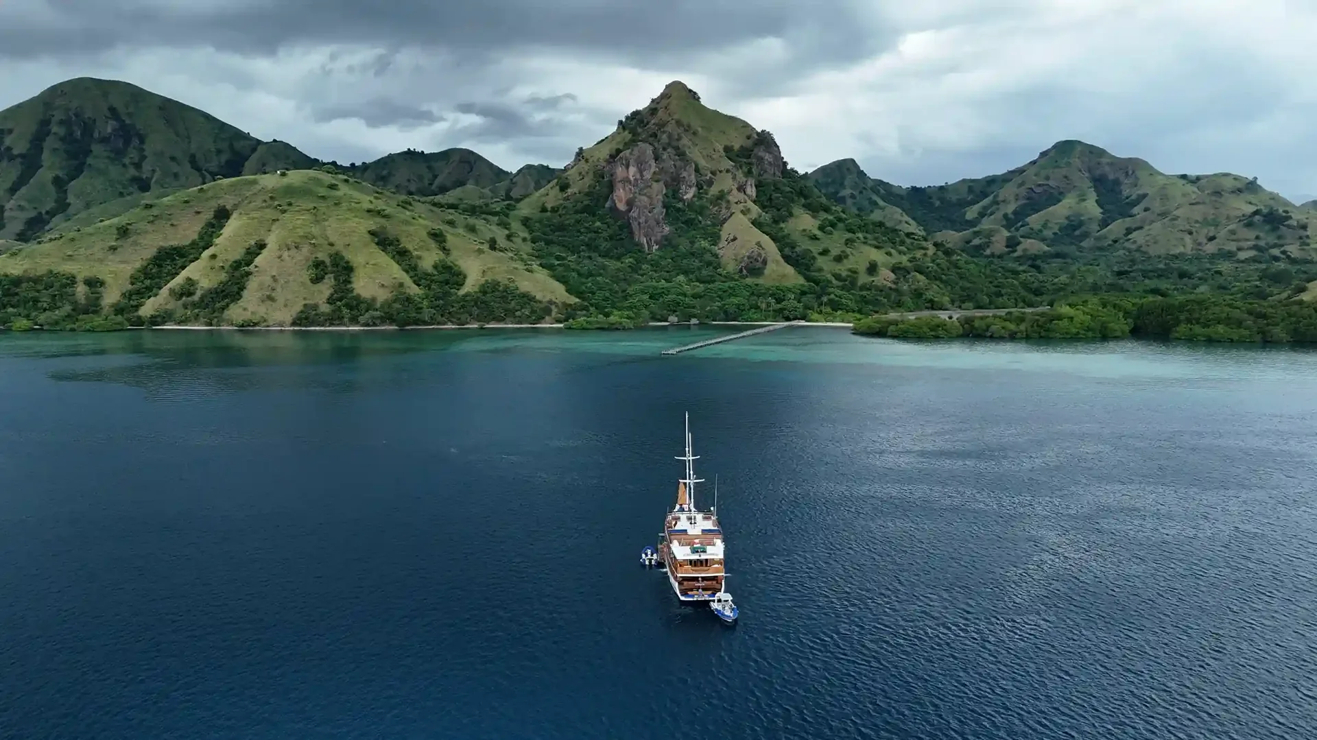 Boat at anchor off the Komodo coast, aerial view