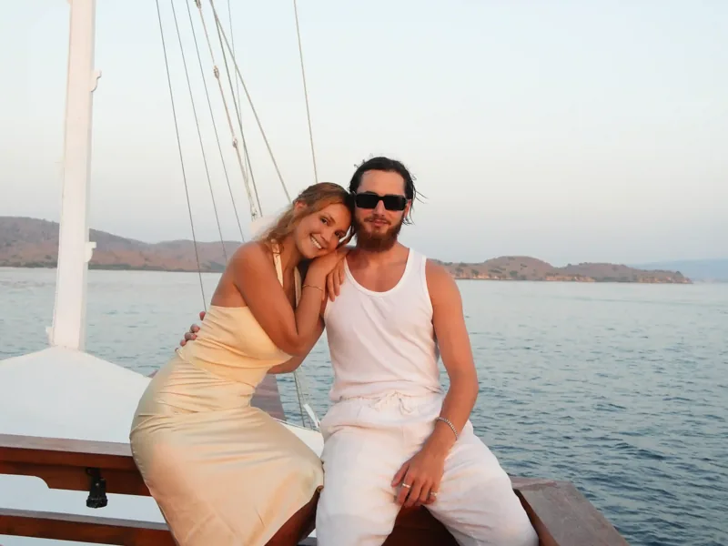 Couple on the deck of a phinisi in Komodo