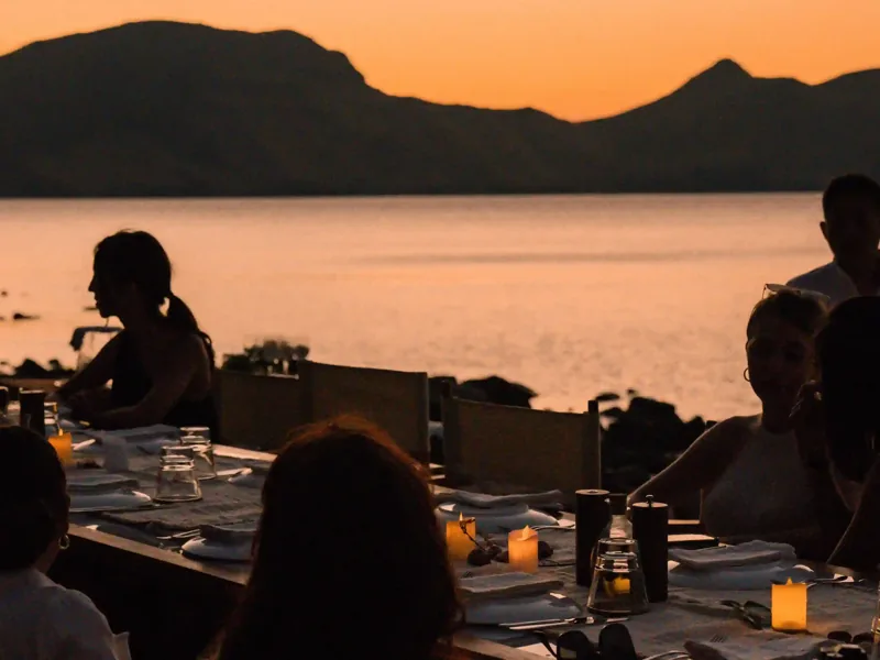 Dinner at sunset on deck in Komodo