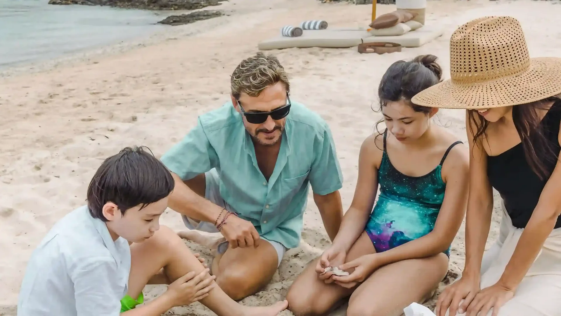Family on a beach in Komodo National Park