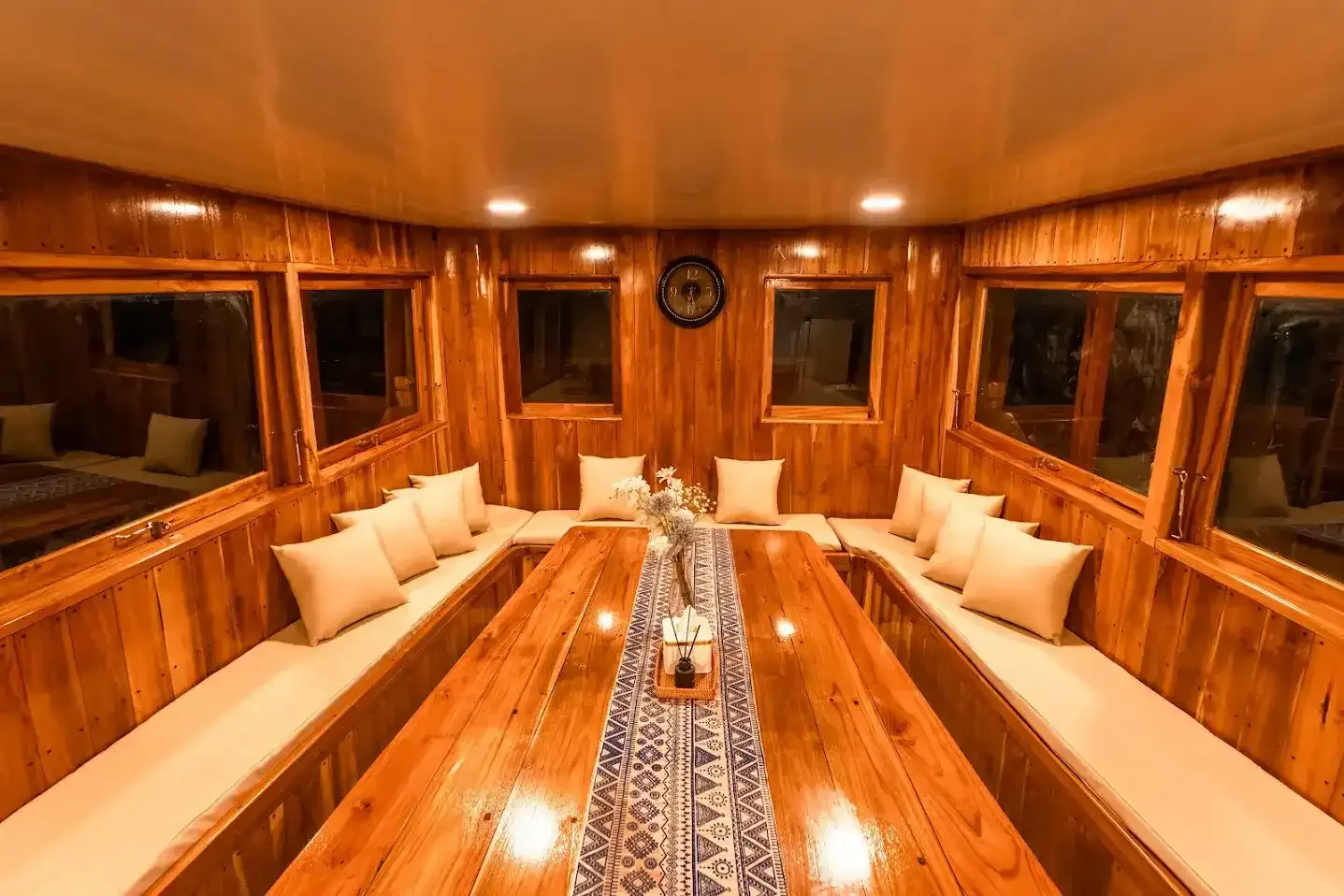 Indoor dining area of a Komodo cruise vessel