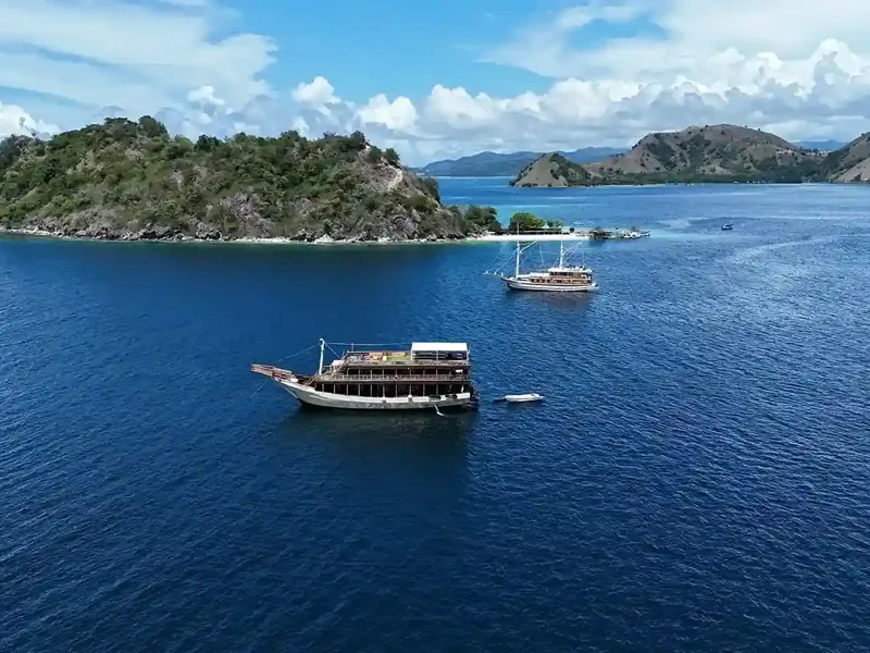 Phinisi anchored off a small island in Komodo National Park