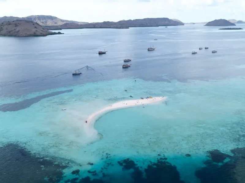 Taka Makassar sandbar with boats anchored nearby