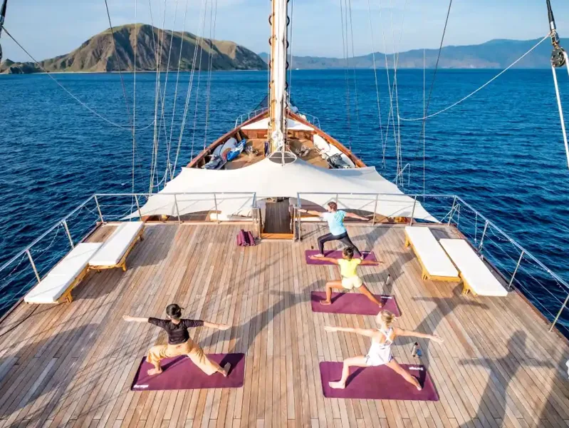 Yoga session on the deck of a phinisi